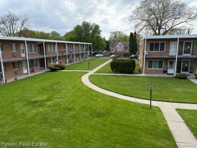 17121 Redford St Unit 212, Detroit, MI 48219 - view of home's community featuring a yard