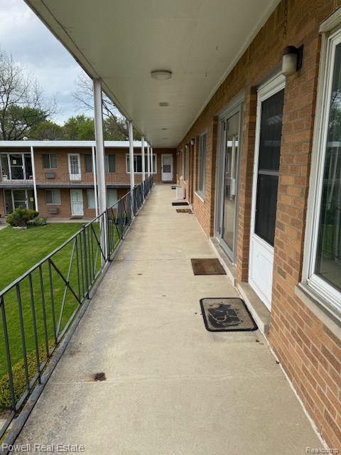 17121 Redford St Unit 212, Detroit, MI 48219 - view of patio featuring a balcony