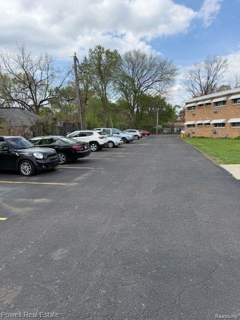 17121 Redford St Unit 212, Detroit, MI 48219 - view of uncovered parking lot
