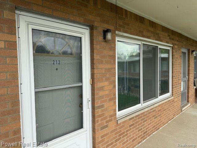 17121 Redford St Unit 212, Detroit, MI 48219 - entrance to property with brick siding