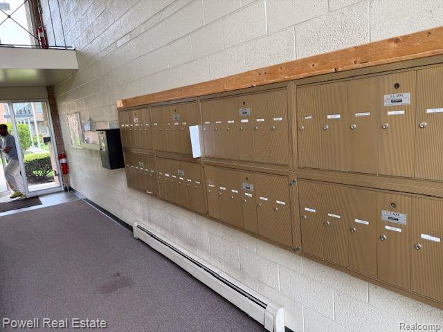 17121 Redford St Unit 212, Detroit, MI 48219 - exterior space with mail area and baseboard heating