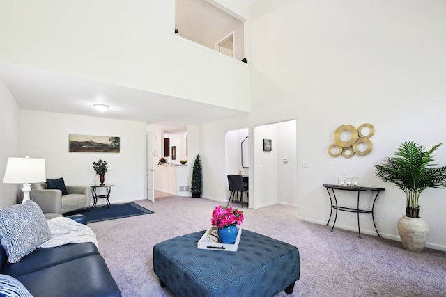 28986 Christopher Ln, Southfield, MI 48034 - carpeted living area featuring baseboards and a high ceiling