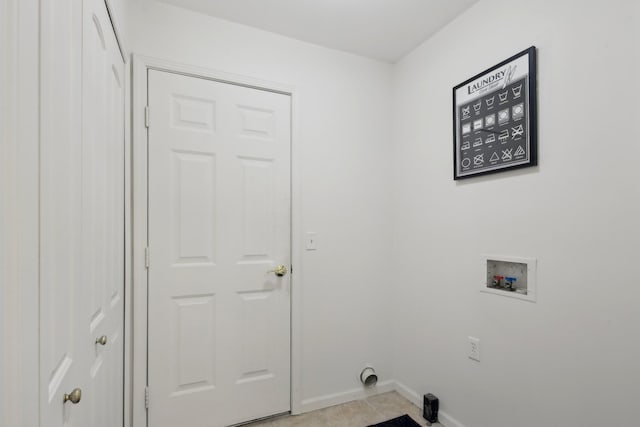 28986 Christopher Ln, Southfield, MI 48034 - laundry room with hookup for a washing machine, baseboards, and light tile patterned floors