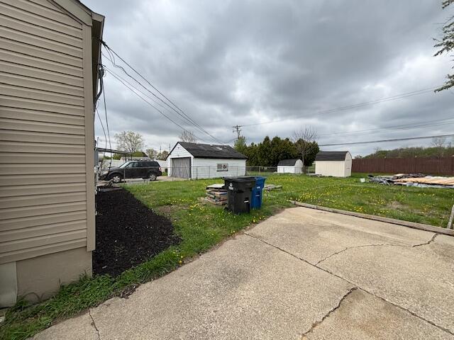 4770 Matthew St, Westland, MI 48186 - view of green lawn featuring a patio area