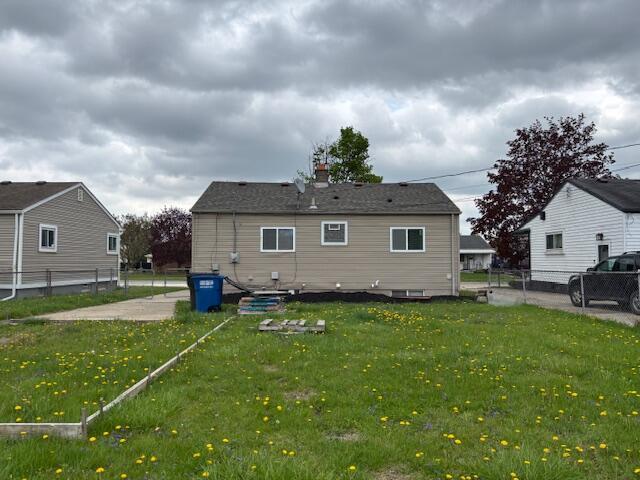 4770 Matthew St, Westland, MI 48186 - back of property featuring a chimney