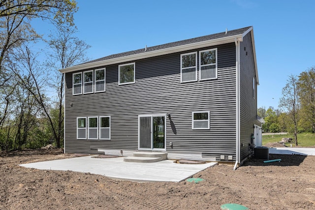 15250 Alister Mackenzie Ave, Augusta, MI 49012 - back of house with a patio and central air condition unit