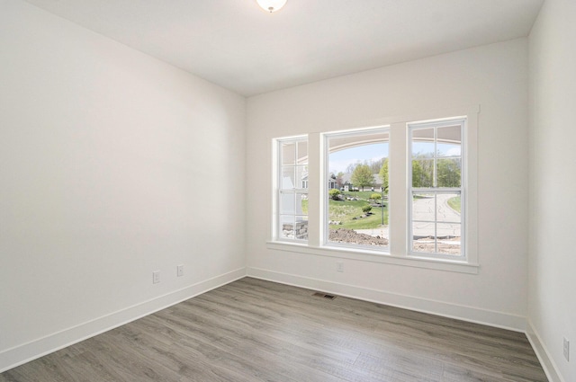 15250 Alister Mackenzie Ave, Augusta, MI 49012 - empty room featuring wood finished floors and baseboards