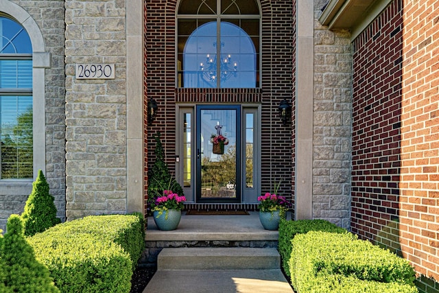 26930 Victory Ct, South Lyon, MI 48178 - property entrance with brick siding and stone siding
