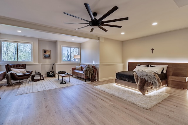 26930 Victory Ct, South Lyon, MI 48178 - bedroom with multiple windows, wood finished floors, recessed lighting, and ceiling fan