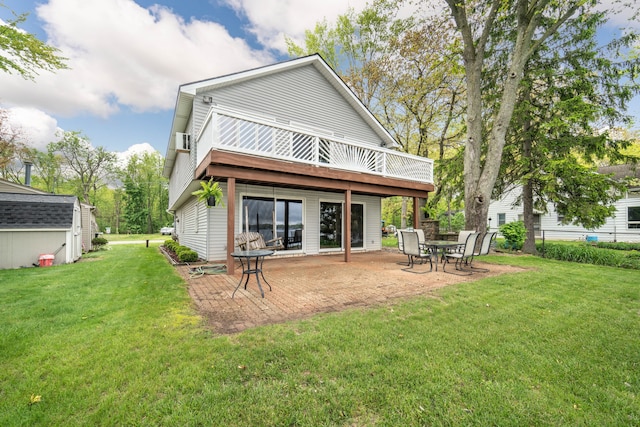 10194 Elmcrest Rd, Whitmore Lake, MI 48189 - rear view of property with a patio area, an outdoor structure, and a deck