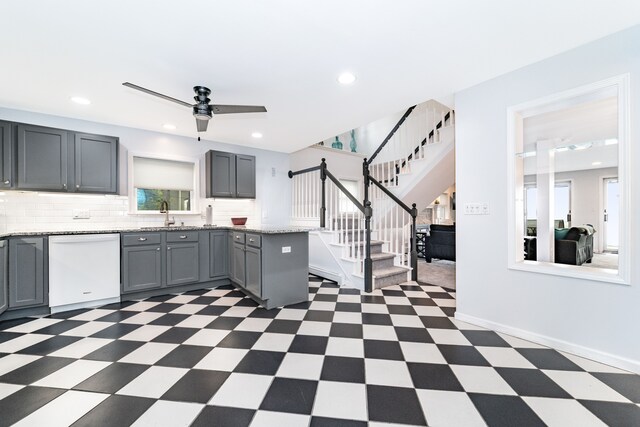 10194 Elmcrest Rd, Whitmore Lake, MI 48189 - kitchen with white dishwasher, gray cabinetry, dark flooring, a ceiling fan, and recessed lighting