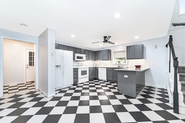10194 Elmcrest Rd, Whitmore Lake, MI 48189 - kitchen featuring white appliances, gray cabinets, ceiling fan, tile patterned floors, and tasteful backsplash