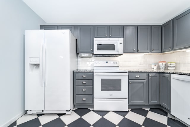 10194 Elmcrest Rd, Whitmore Lake, MI 48189 - kitchen featuring white appliances, light floors, gray cabinets, and tasteful backsplash