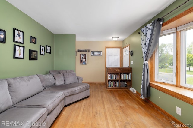 94 Crescent Lake Rd, Waterford, MI 48327 - living room with wood finished floors and baseboards