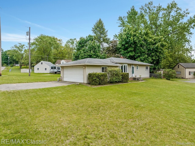 94 Crescent Lake Rd, Waterford, MI 48327 - view of front of home featuring driveway, a front yard, and a garage