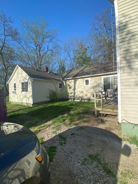 437 W Mount Morris St, Mount Morris, MI 48458 - view of green lawn featuring a deck
