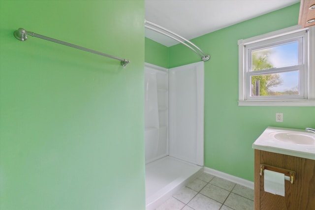 7244 Neff Rd, Mount Morris, MI 48458 - full bathroom with a shower, tile patterned flooring, baseboards, and vanity