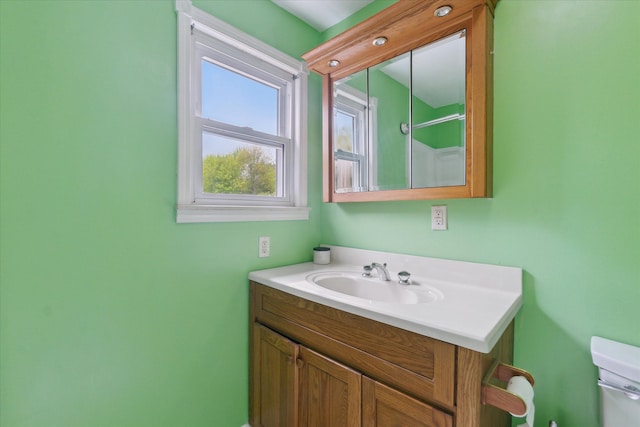 7244 Neff Rd, Mount Morris, MI 48458 - bathroom featuring vanity and toilet
