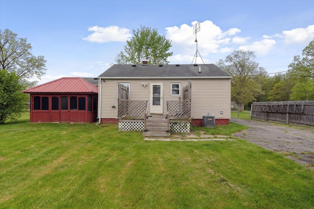 7244 Neff Rd, Mount Morris, MI 48458 - rear view of house with central air condition unit and crawl space
