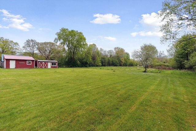 7244 Neff Rd, Mount Morris, MI 48458 - view of green lawn featuring an outdoor structure