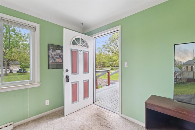 7244 Neff Rd, Mount Morris, MI 48458 - foyer with a baseboard radiator, carpet, and baseboards