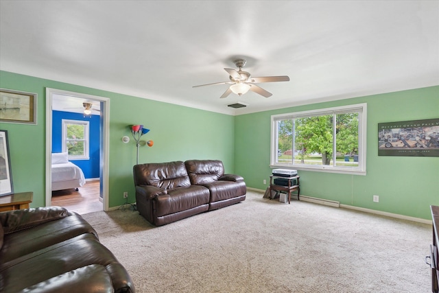 7244 Neff Rd, Mount Morris, MI 48458 - carpeted living area featuring a ceiling fan and baseboards