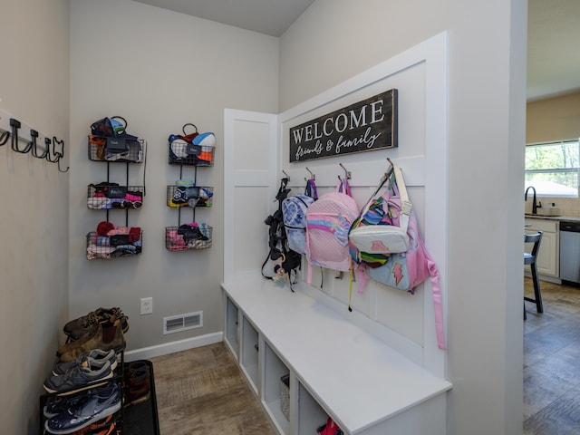 59376 Silvergrass Ave, Mattawan, MI 49071 - mudroom with wood finished floors, a sink, and baseboards