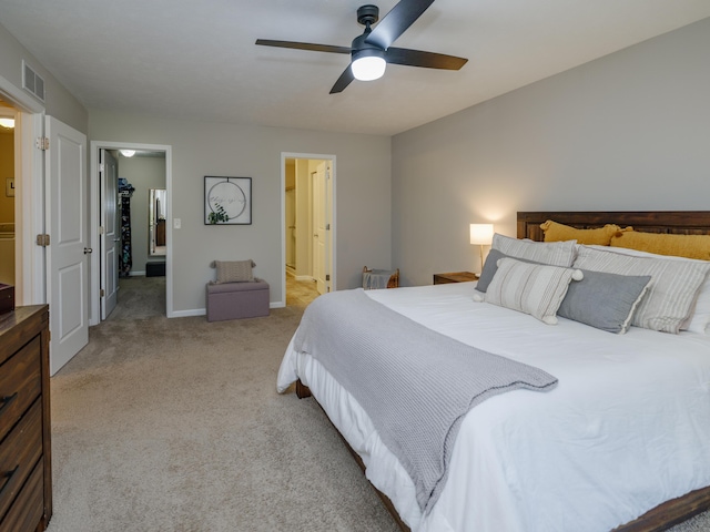 59376 Silvergrass Ave, Mattawan, MI 49071 - bedroom featuring light colored carpet, ensuite bath, baseboards, and a ceiling fan