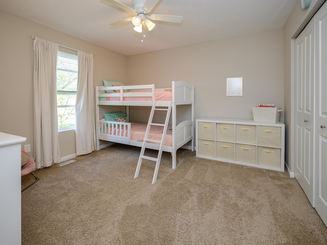 59376 Silvergrass Ave, Mattawan, MI 49071 - bedroom with carpet floors, a closet, a ceiling fan, and baseboards