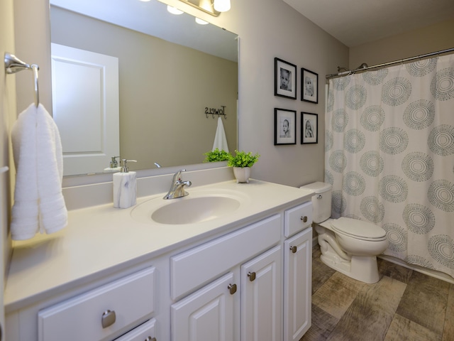 59376 Silvergrass Ave, Mattawan, MI 49071 - full bath with vanity, toilet, and wood finished floors