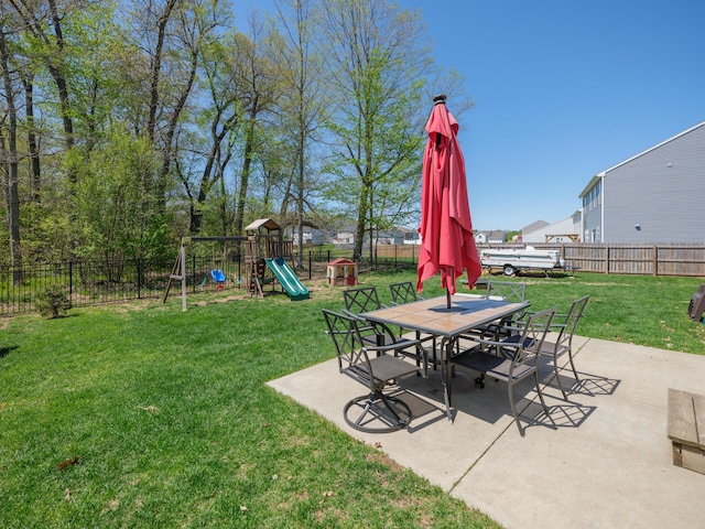 59376 Silvergrass Ave, Mattawan, MI 49071 - view of yard featuring a patio, outdoor dining space, and a playground