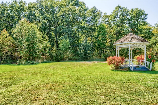 10186 Carlee June Dr, Fenton, MI 48430 - view of grassy yard featuring a gazebo