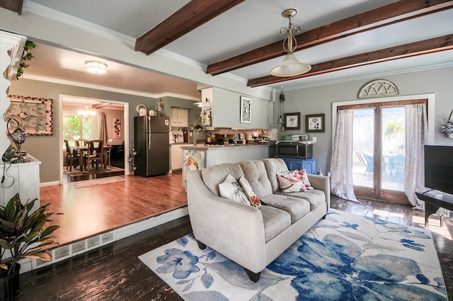 10186 Carlee June Dr, Fenton, MI 48430 - living room featuring healthy amount of natural light, wood finished floors, a chandelier, ornamental molding, and beam ceiling