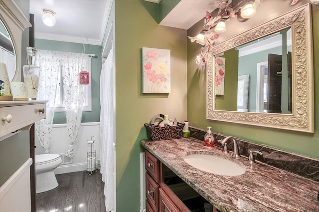 10186 Carlee June Dr, Fenton, MI 48430 - bathroom with crown molding, vanity, toilet, a shower with shower curtain, and wood finished floors