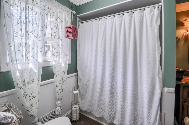 10186 Carlee June Dr, Fenton, MI 48430 - full bath featuring toilet and wood finished floors