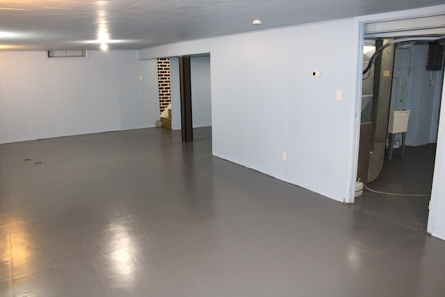 finished basement featuring stairway