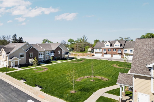 611 Woodland Dr, Dexter, MI 48130 - view of green lawn with a residential view