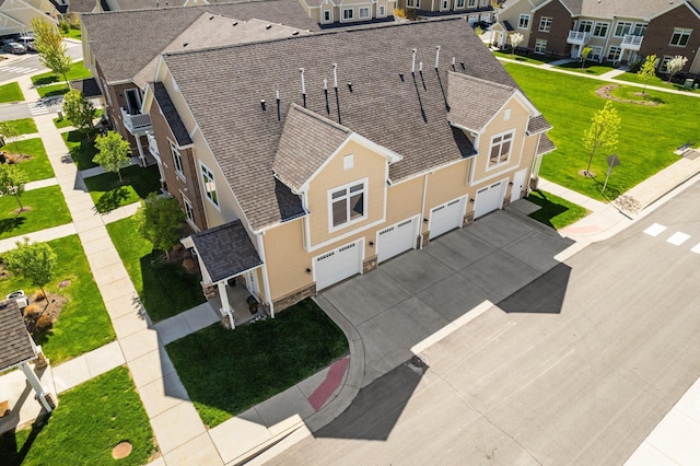 611 Woodland Dr, Dexter, MI 48130 - aerial perspective of suburban area