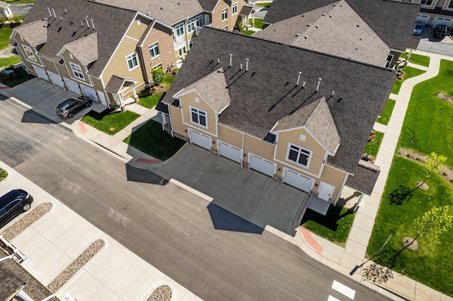 611 Woodland Dr, Dexter, MI 48130 - aerial perspective of suburban area