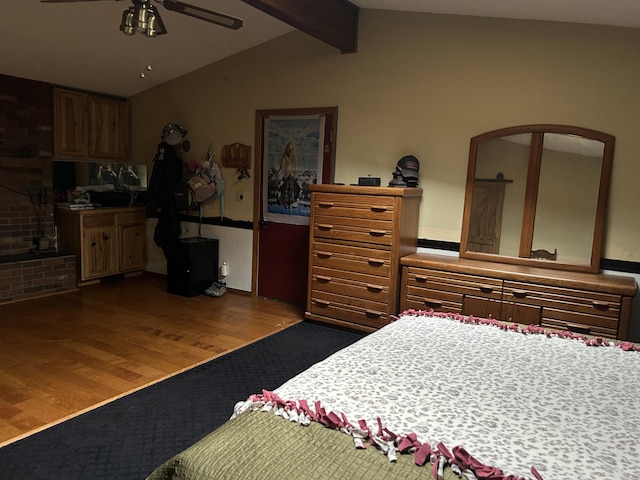 29 Douglas Ave, Coldwater, MI 49036 - carpeted bedroom featuring wood finished floors, arched walkways, and ceiling fan