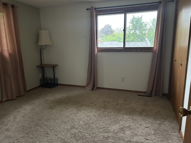 29 Douglas Ave, Coldwater, MI 49036 - carpeted spare room featuring baseboards