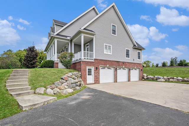 7812 Fountain Hills Ln, Davisburg, MI 48350 - view of side of home with stairs, a garage, brick siding, driveway, and a yard