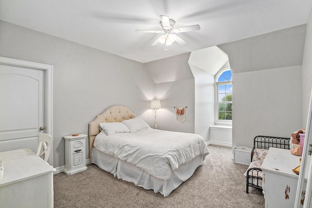 7812 Fountain Hills Ln, Davisburg, MI 48350 - bedroom with light carpet, baseboards, vaulted ceiling, and ceiling fan