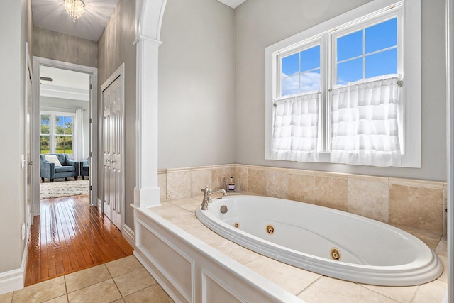 7812 Fountain Hills Ln, Davisburg, MI 48350 - full bathroom featuring a tub with jets and tile patterned floors