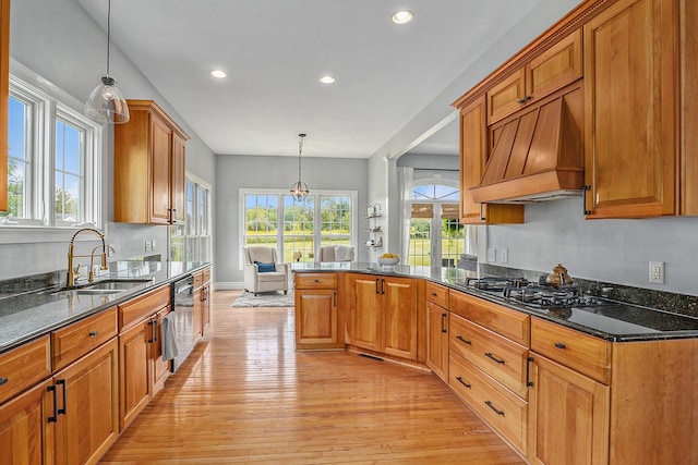 7812 Fountain Hills Ln, Davisburg, MI 48350 - kitchen with a sink, custom exhaust hood, light wood-style floors, healthy amount of natural light, and recessed lighting