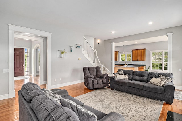 7812 Fountain Hills Ln, Davisburg, MI 48350 - living area with stairway, light wood-style floors, baseboards, and recessed lighting