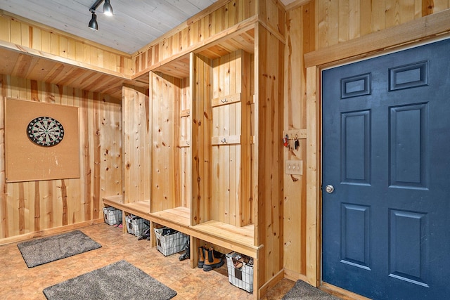 7812 Fountain Hills Ln, Davisburg, MI 48350 - mudroom with wooden walls, track lighting, and baseboards