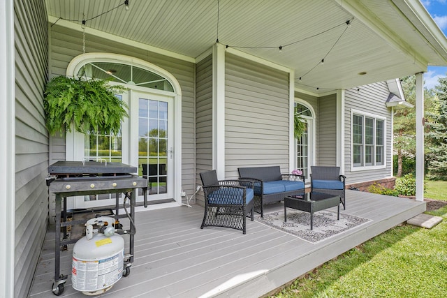 7812 Fountain Hills Ln, Davisburg, MI 48350 - wooden deck featuring an outdoor living space