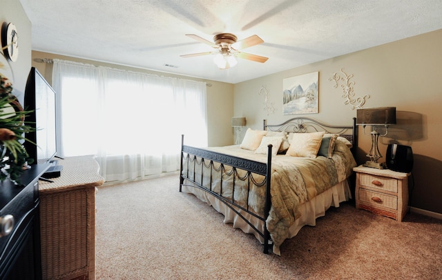 bedroom featuring carpet floors and ceiling fan