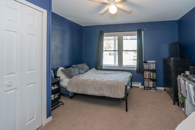 472 Central St, Marysville, MI 48040 - bedroom featuring a baseboard radiator, carpet, and a ceiling fan